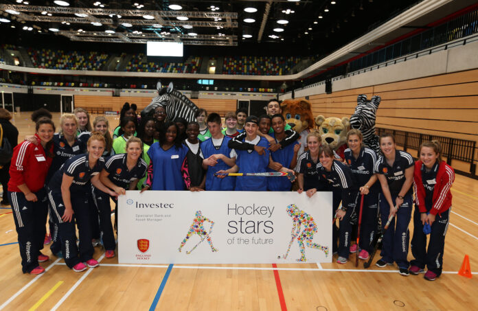 Kate Walsh and the members of the England women's hockey team at teh Copper Box