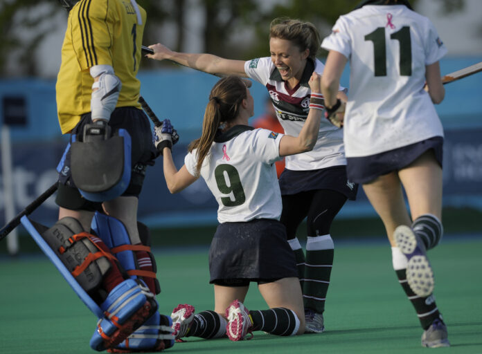 Surbiton's Beckie Herbert celebrates scoring with teammate Sarah Page against Reading at the Investec Women's Finals Weekend.jpg