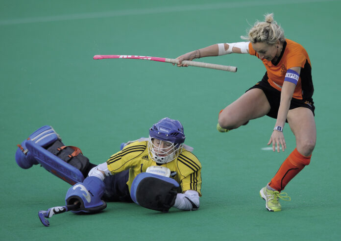 Reading’s Sarah Ellis saves from Leicester’s Vanessa Hawkins in the 2013 shoot-out (c) Ady Kerry