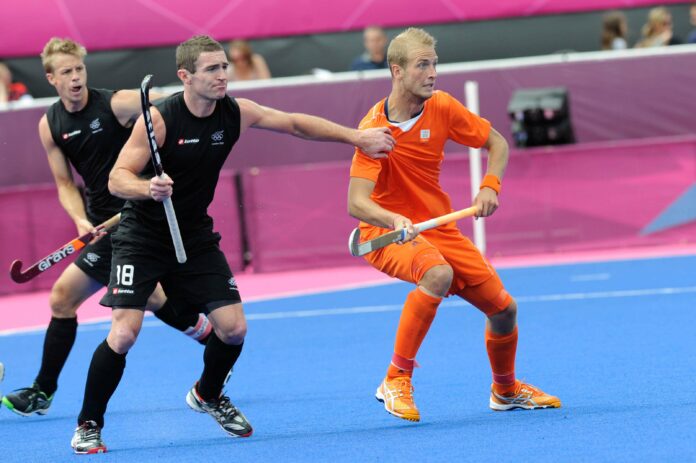 Phil Burrows (l) and Netherlands' Billy Bakker at the 2012 Olympic Games